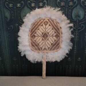 vintage wicker fan wall decor
